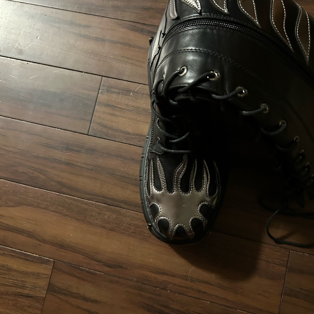 Sleek Black and Silver Boots with Modern Design